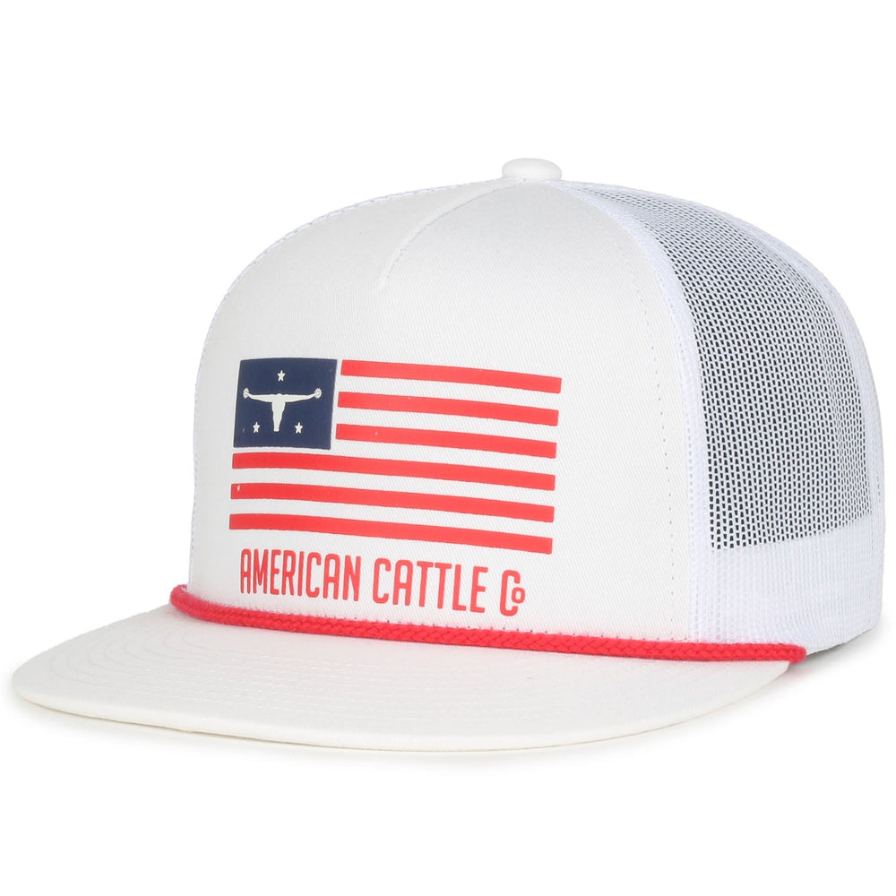 Show your ranching pride with the American Cattle Co ACC Flag Hat: a white mesh snapback trucker hat with flat brim, red trim, and a stylized flag and longhorn graphic. “AMERICAN CATTLE” is boldly printed below.
