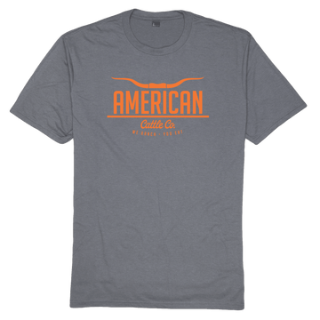 Show your farming pride with the American Cattle Co Tee—a grey shirt featuring bold orange text, ideal for fans of the agricultural lifestyle.
