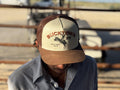 A person wearing a Rural Cloth Bucktown Original Hat with 