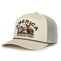 The Rural Cloth Deer Hunter Hat-Khaki features a mesh back, adjustable snapback, and an embroidered deer, mountains, and trees design with “AMERICA WE GROW DEER” text—perfect for any whitetail enthusiast.