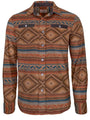 The Rural Cloth Desperado Polar Fleece is a long-sleeve, button-up shirt jacket in red/tan with a Southwestern geometric pattern, two chest pockets with buttoned flaps, and a collar for versatile layering.