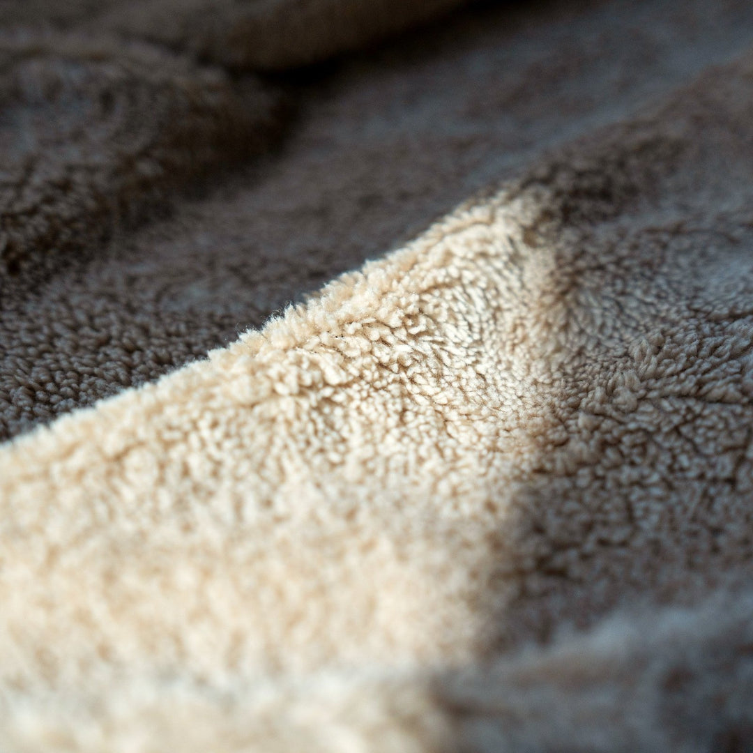 Close-up of the soft sherpa lining inside the American Cattle Co Homestead Jacket in Buck.