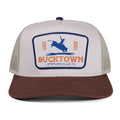 The Rural Cloth Last Out Hat is a two-tone western snapback with a white front, brown bill, and a patch reading 