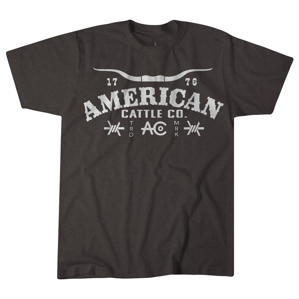 The Rural Cloth Longhorn Barb Tee is a black T-shirt with "American Cattle Co. 1776" in white, featuring a longhorn silhouette above and a barbell graphic below—a classic Western tee for everyday wear.