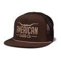 The Rural Cloth Longhorn Hat features a brown mesh, flat brim, tan piping on the visor, and a 5-panel snapback design. 