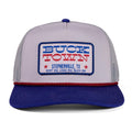 The Rural Cloth Patriot Hat is a gray and blue trucker hat with a red rope, featuring a 