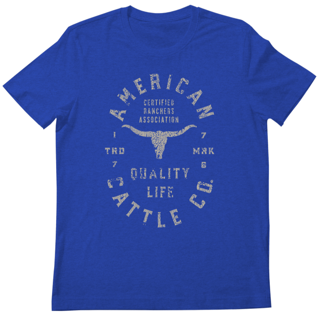 The Rural Cloth Quality Tee is a blue shirt featuring a graphic steer skull and distressed "American Cattle Co. Certified Ranchers Association Quality Life 1978 Mark" text—an ideal ranching tribute for any American cattle rancher.