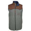 The Rider vest is a sleeveless, light gray quilted design featuring a zip front and a contrasting brown western yoke across the shoulders. It has a standing collar, two zippered side pockets, and a small rectangular patch on the chest for added style.
