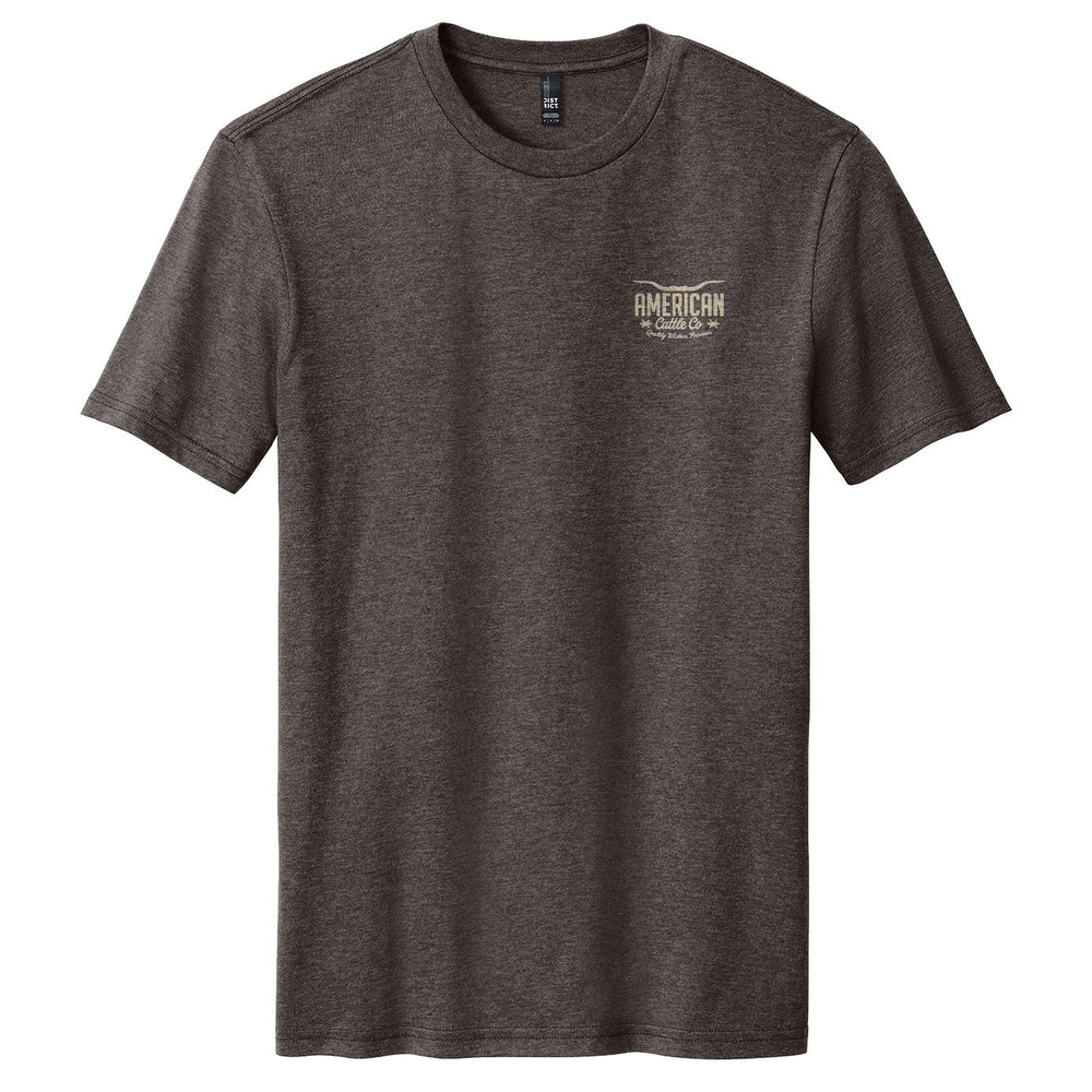 The American Cattle Co Rodeo Star Tee is a heathered dark gray short-sleeve western shirt with a small "American Modelers" logo on the left chest and a classic crewneck design.