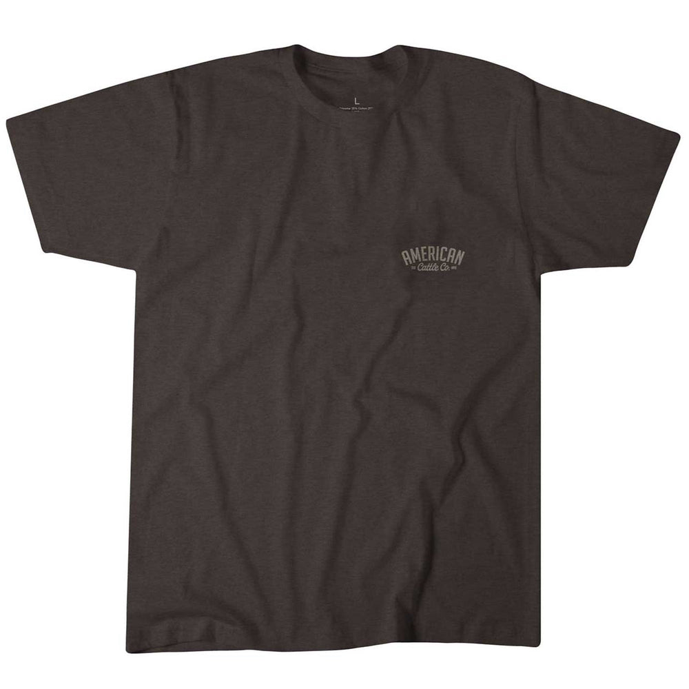 The Roper Tee by American Cattle Co is a plain dark brown short-sleeve shirt with "AMERICAN Classic Car" in small light letters on the left chest, styled like a vintage longhorn tee. Shown flat on a white background.