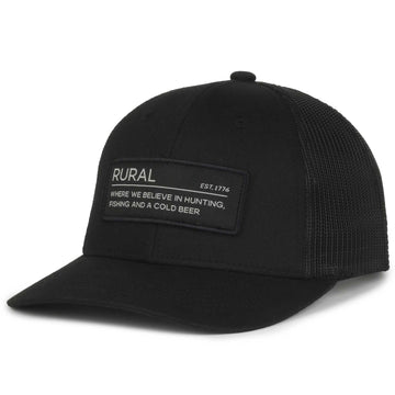 Rural Def Hat in black — snapback with mesh back and front patch reading RURAL, EST. 1776, WHERE WE BELIEVE IN HUNTING, FISHING AND A COLD BEER.