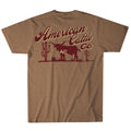 The Shadowhorn Tee by Rural Cloth features a gold heather short-sleeve design with a bold maroon bull, two cacti, and 
