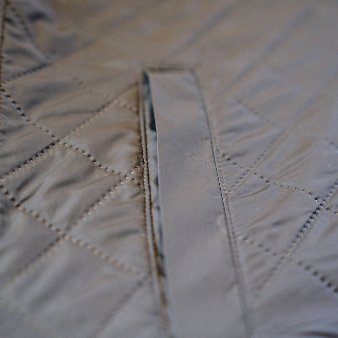 Diamond quilting and welt hand pocket on the Sunday Jacket in Thundercloud.
