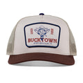 The Outlaw GOAT Hat by Rural Cloth is a beige and brown western trucker with a mesh back, front patch reading 