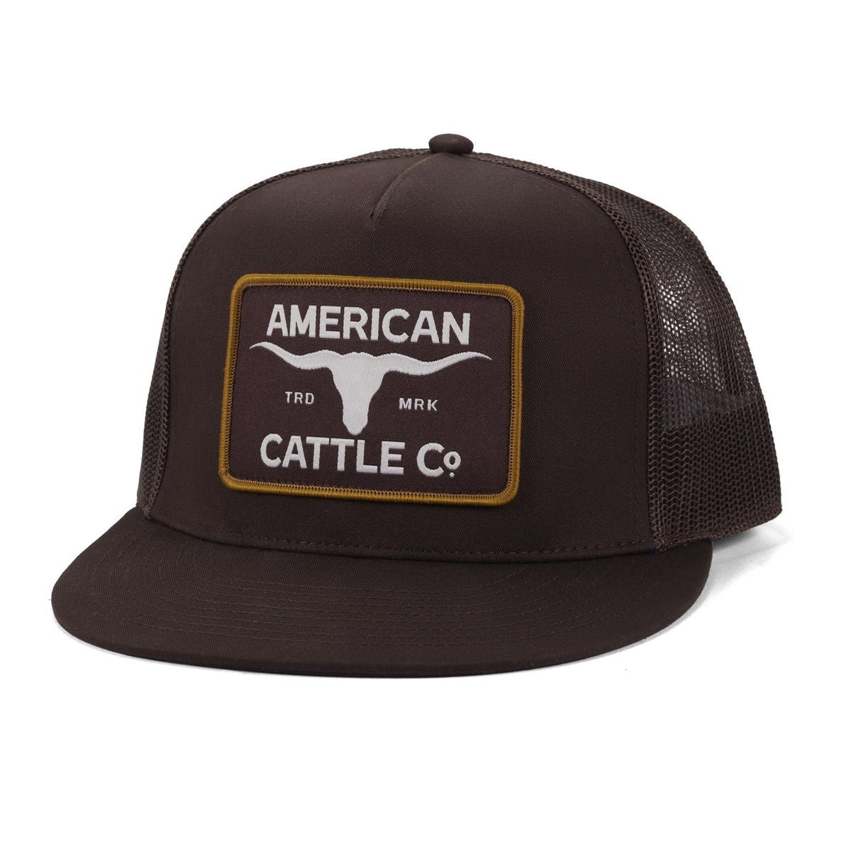 The Trademark Hat by American Cattle Co is a black snapback trucker cap with a mesh back and flat brim. The front showcases a rectangular patch with a white longhorn graphic in the center, framed by a gold border, and "American Cattle Co." text—making it an ideal choice for fans of classic longhorn skull hat styles.