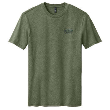 A heathered olive green Waterline Tee by American Cattle Co is shown on a white background, featuring "AMERICAN EAGLE" text and a small cattleman’s life graphic printed on the left chest.