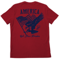 The We Grow Freedom Tee by Rural Cloth is a red, patriotic shirt that features a large American eagle gripping an American flag in its beak on the back. The design includes 