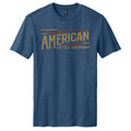 The Wiremark Tee by American Cattle Co is a rugged blue t-shirt with bold text that channels a classic Americana vibe.