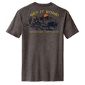 The Workhorse Tee by American Cattle Co features a dark gray vintage design of a dirt biker riding near a bull with mountains, cacti, and the sun. “GET IT DONE!” decorates the top; “AMERICAN CATTLE CO.” is printed below for rugged style.