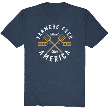 Show your support for American agriculture with the Rural Cloth Pitchfork Tee, a blue shirt featuring two golden pitchforks and bold "Farmers Feed America" text, with "Rural Cloth" elegantly scripted between the crossed pitchforks.